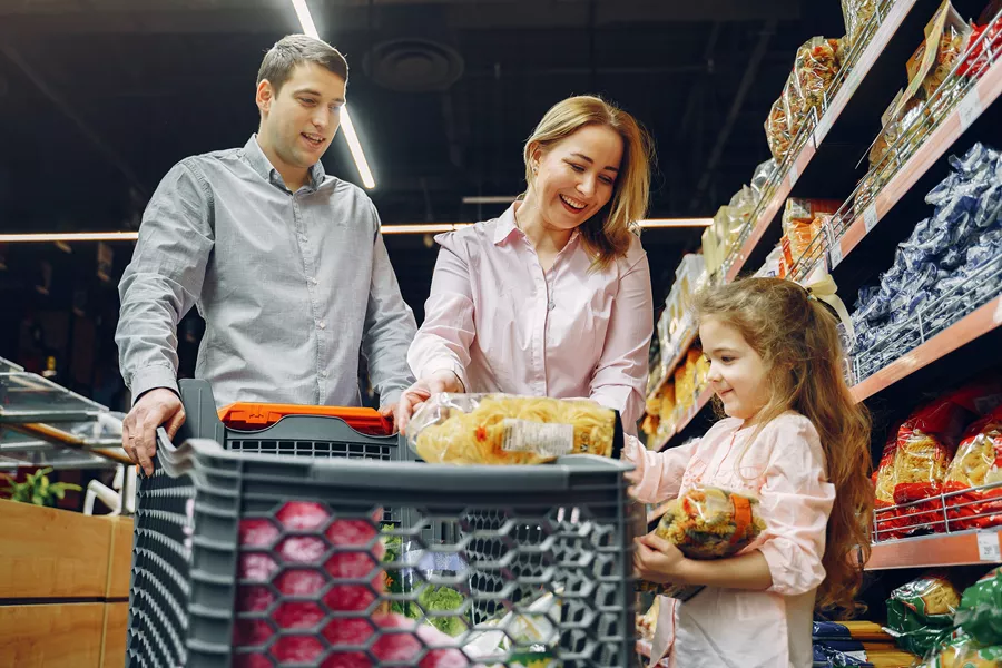 Family Exploring Local Grocery Store